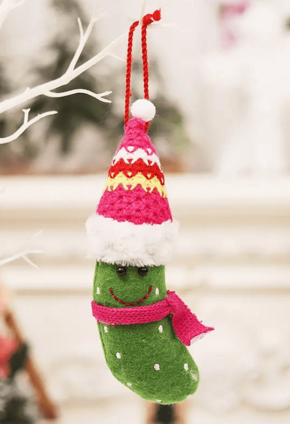 Atlanta Pickles Christmas Pickle Ornament hanging on a tree
