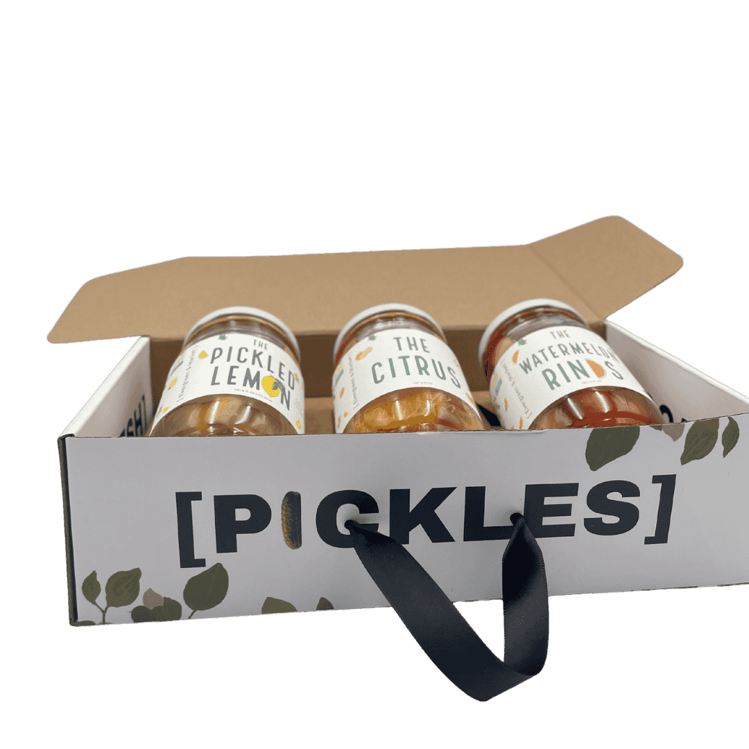 Open [PICKLES] gift box with three jars: The Pickled Lemon, The Citrus and The Watermelon Rinds