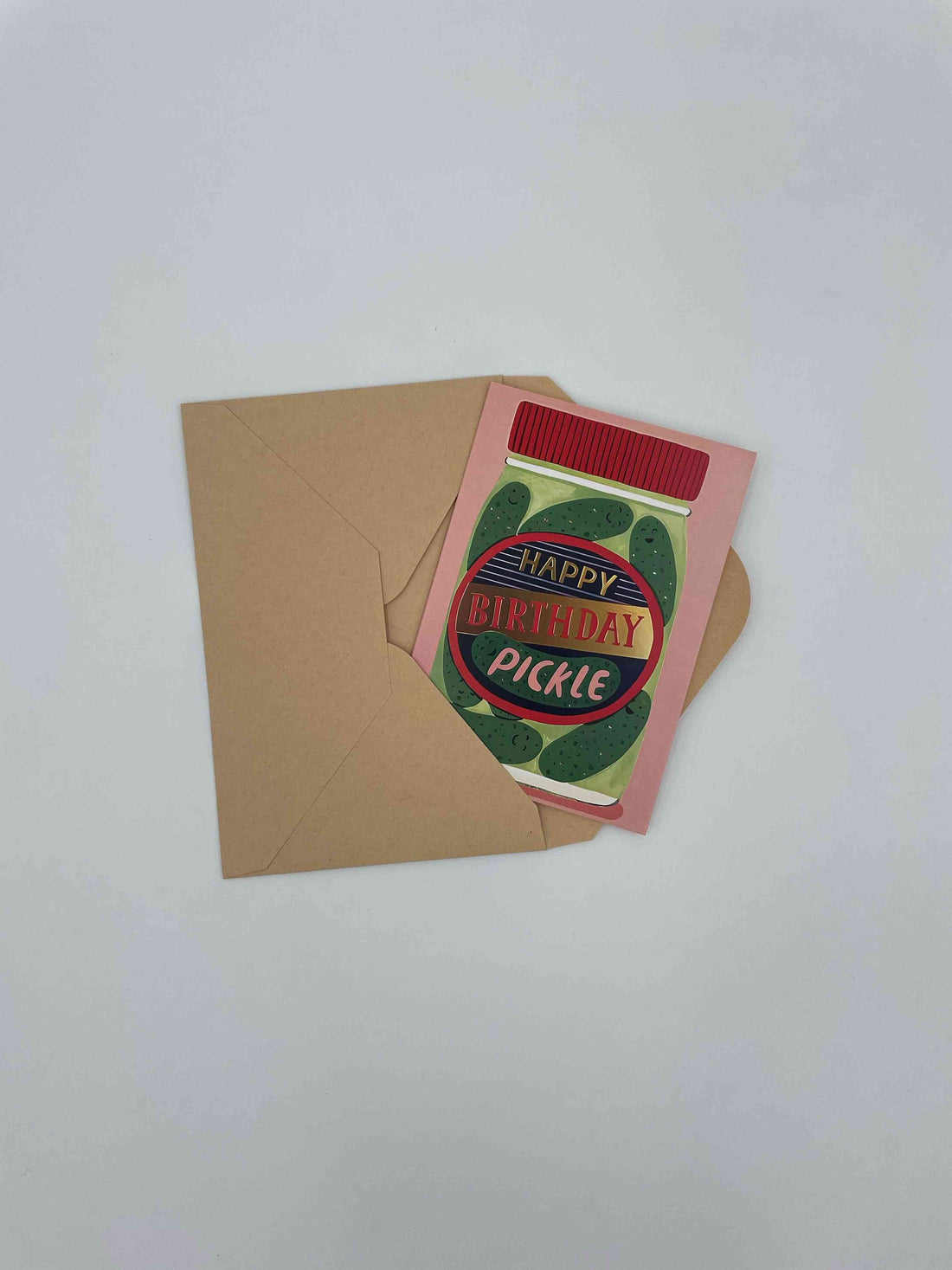 Pink Happy Birthday Pickle card with a pickle jar, on a kraft envelope