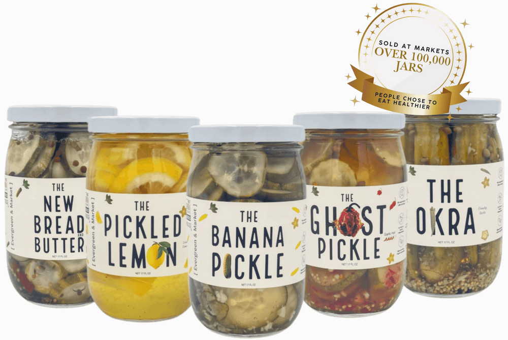 Five jars of pickles with labels on a gray background